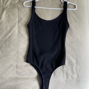 Womens small black low back body suit
